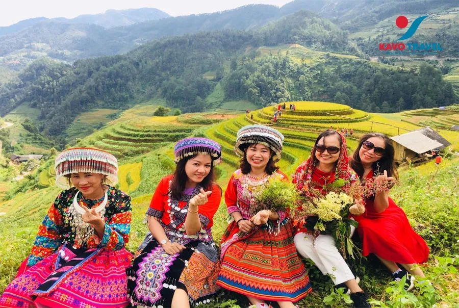 Tourists taking photos at Mu Cang Chai rice terraces, Vietnam