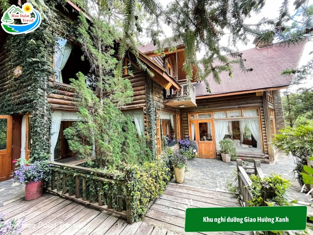 Giao Huong Xanh Resort surrounded by lush greenery and charming wooden architecture offers romantic and artistic wedding photo opportunities
