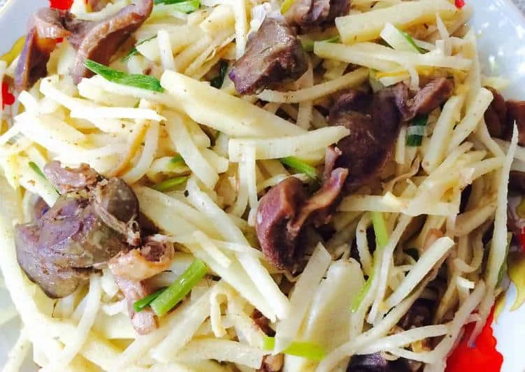 The dish features distinctive tastes: bitter, spicy, sweet, and nutty