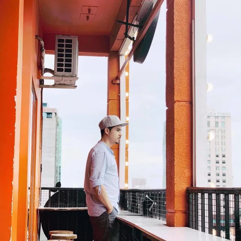 Outdoor seating at Boo Coffee in Apartment 42 Nguyen Hue, overlooking the walking street