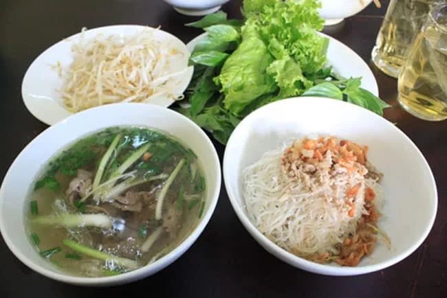 Enjoy the dry pho, then sip the broth to savor its sweet taste
