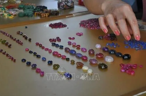Colorful gemstones on display for sale at the market.