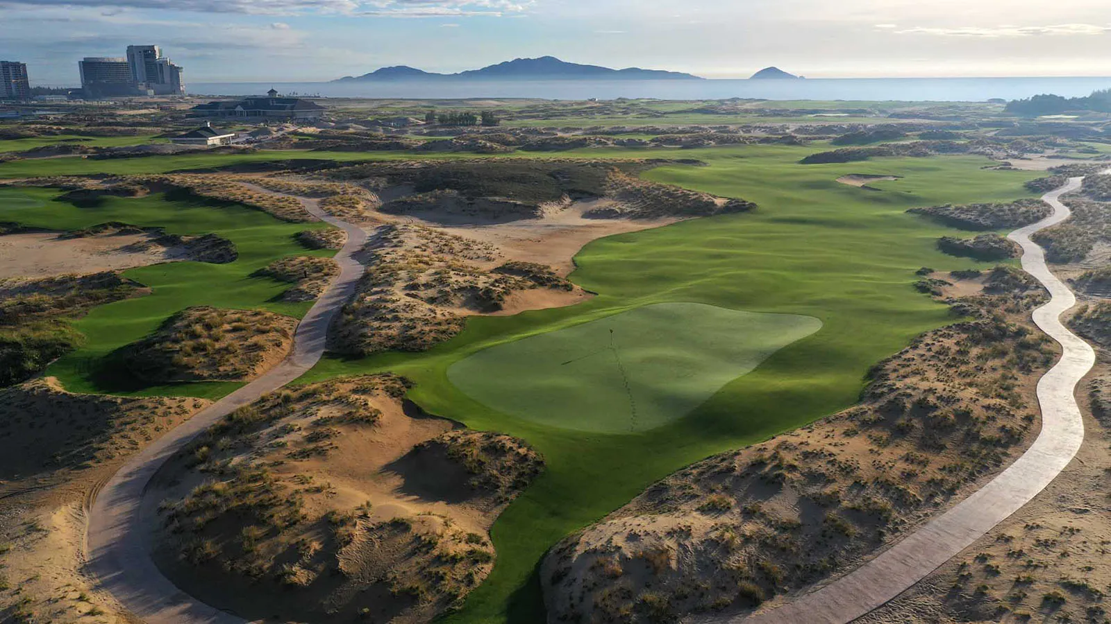 Aerial view of Hoiana Shores Golf Club with ocean and coastline