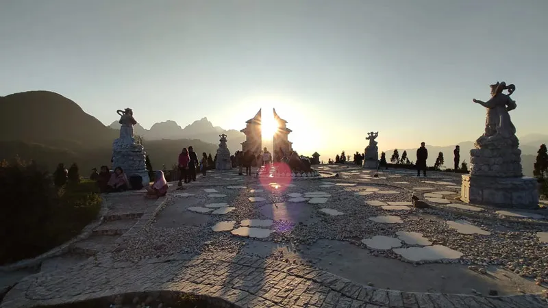 Sunlight shining through O Quy Ho Heaven Gate creates a magical scene