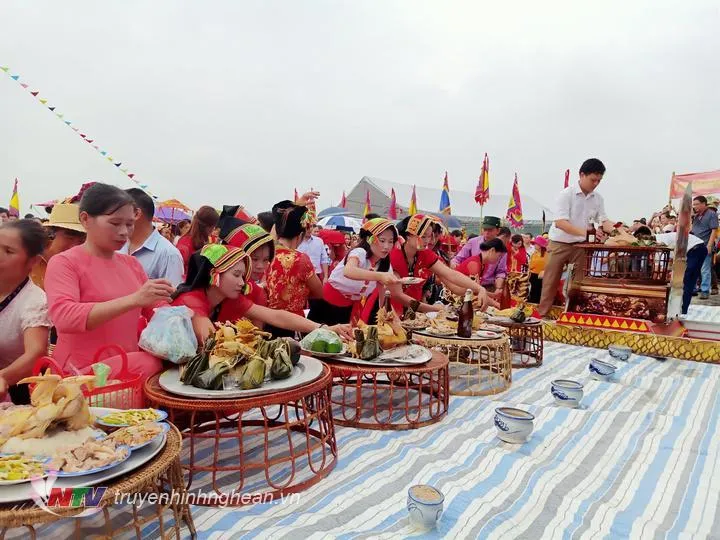 Thai ethnic villagers offer ceremonial items during the traditional Buon Xao festival in Nghe An, Vietnam.