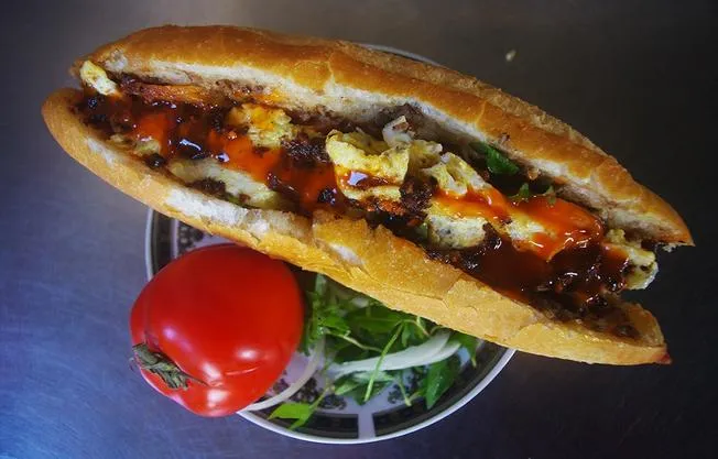 Mrs. Loc's Hoi An Banh Mi is always prepared by her own hands from ingredients to finished products