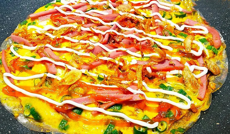 Bánh tráng trứng quán Hai Chị Em Nha Trang, món ăn vặt quen thuộc của học sinh