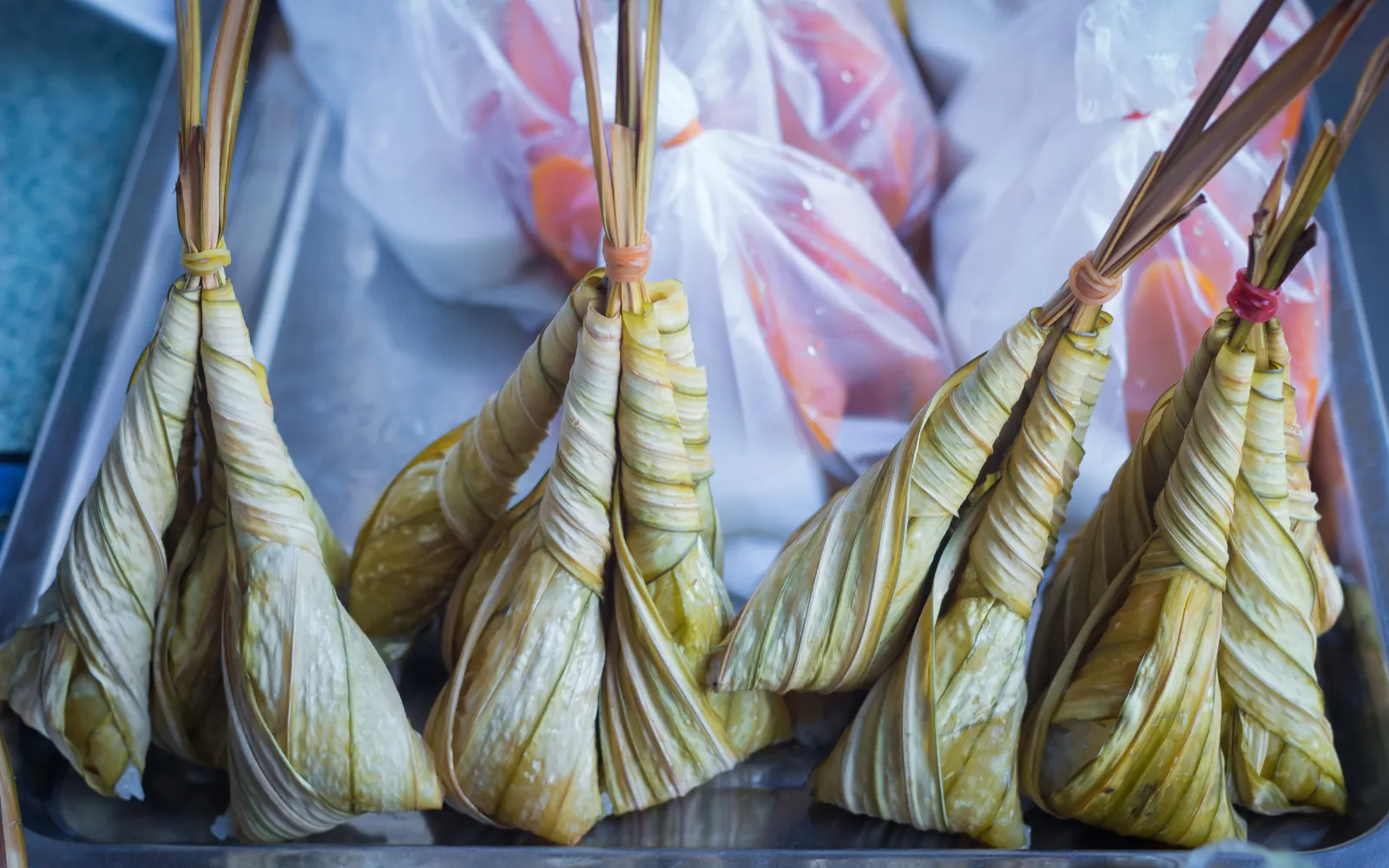 Triangular ash dumplings symbolizing the Fire element in the five elements, carrying strong yang energy.