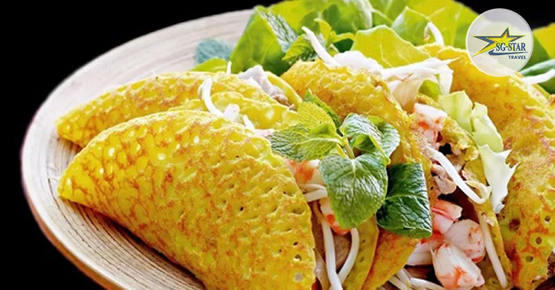 Banh xeo with shrimp and pork, a famous Vietnamese street food, loved for its crispy and flavorful taste