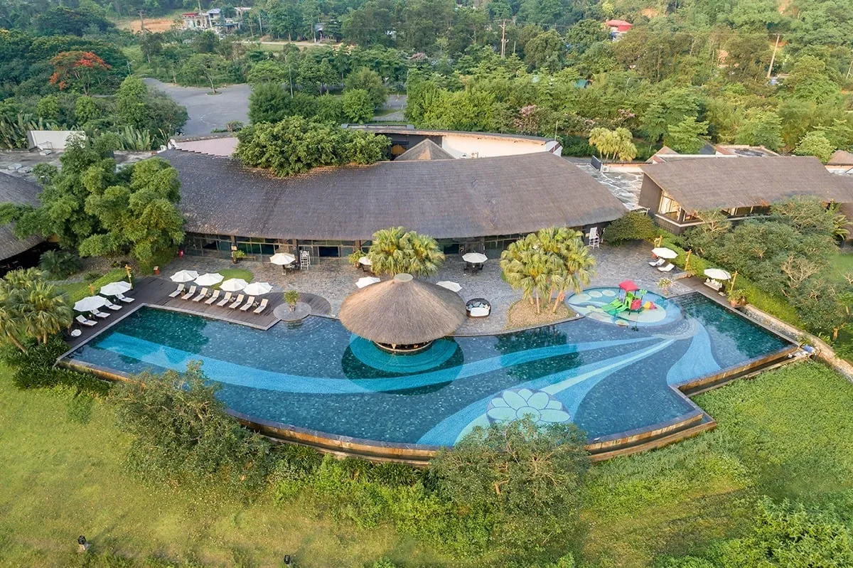 Hot spring pool in a resort in Long Hai, with an open design facing the sea