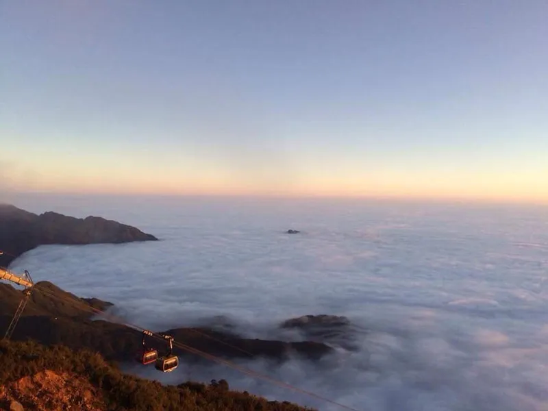 Floating cloud sea on Fansipan peak like ocean waves