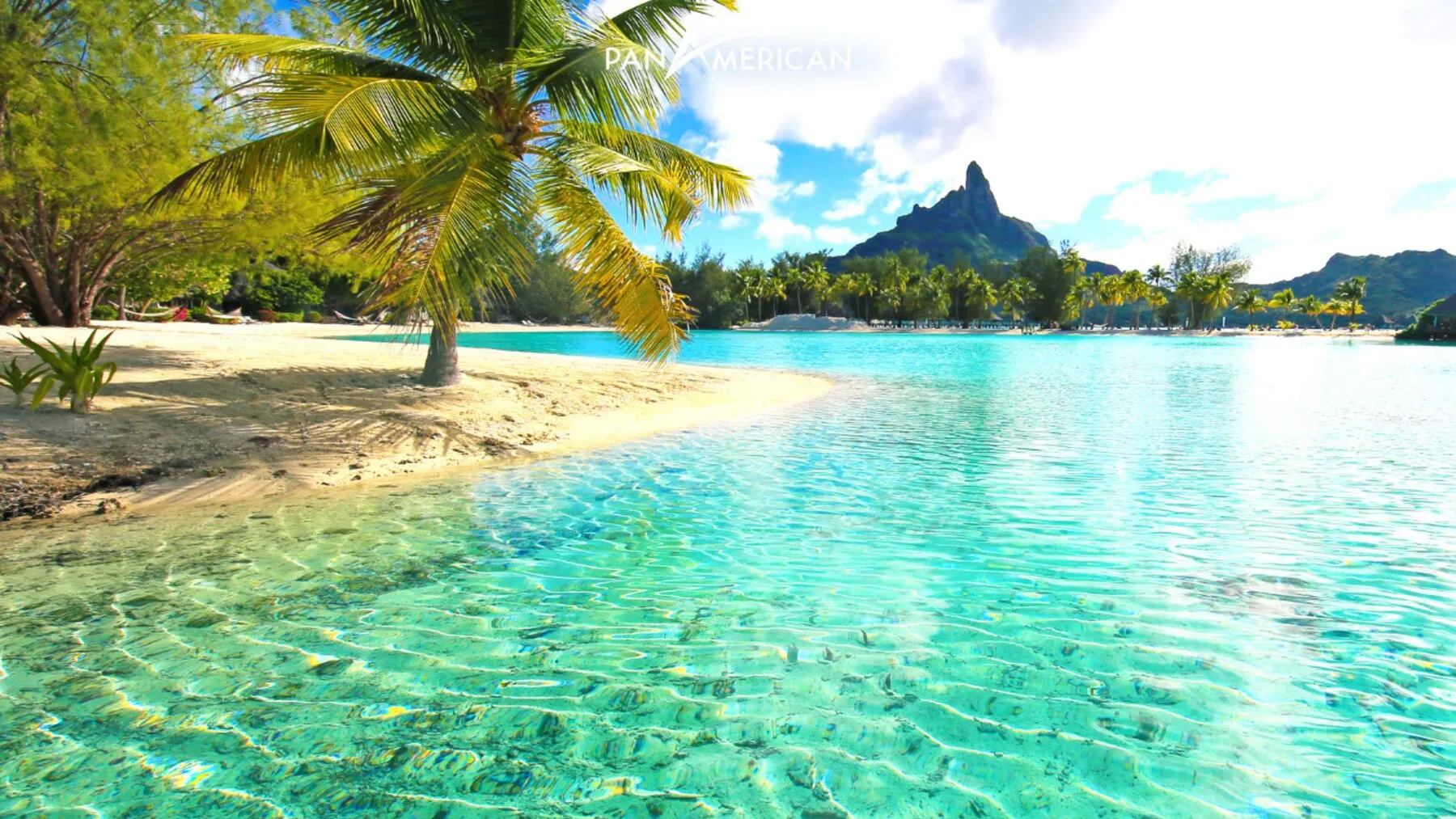 Bora Bora with clear blue water and luxurious resorts