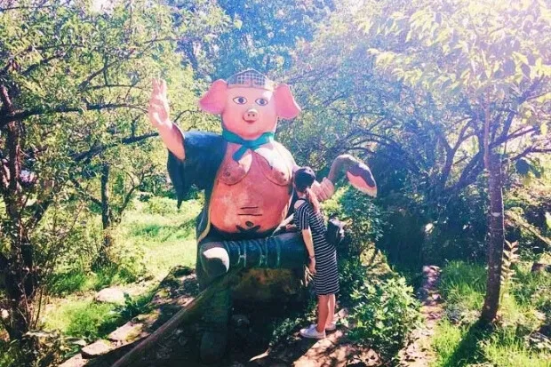 A whimsical zodiac statue adding a touch of fun to the Ham Rong Mountain experience