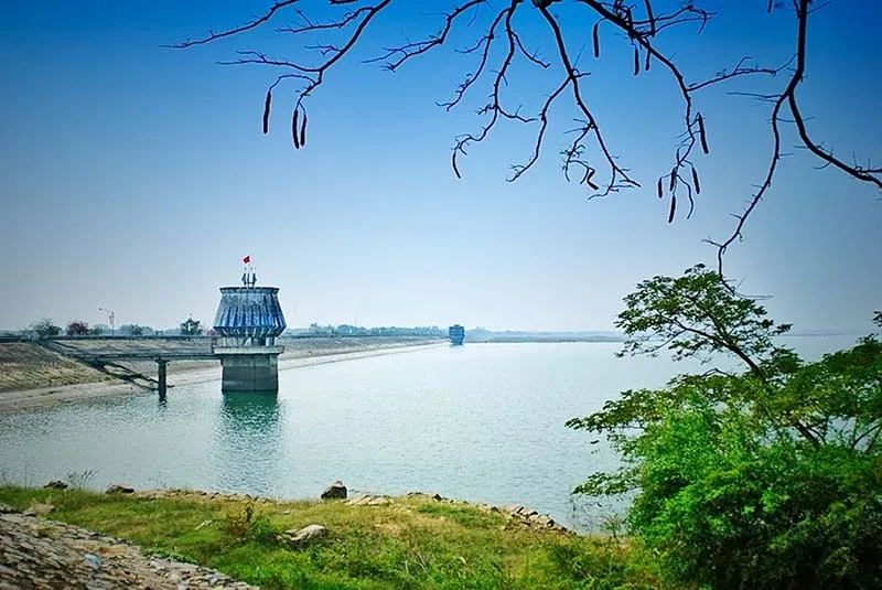 Small bridge leading to the lighthouse, creating a poetic scene