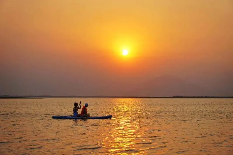 SUP paddling and watching a beautiful sunset on Dau Tieng Lake