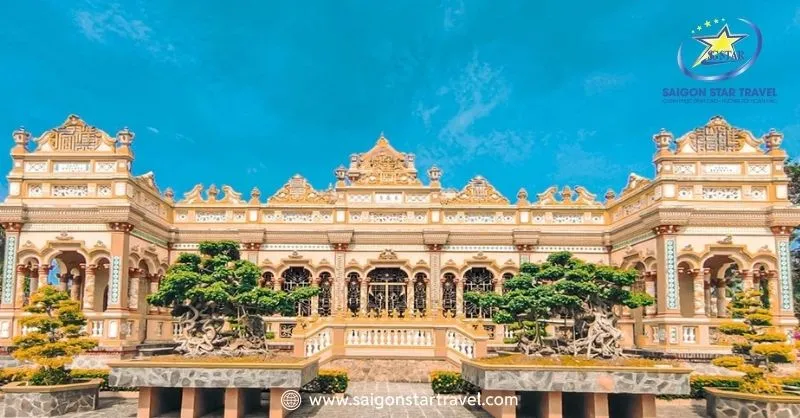 Vinh Trang Pagoda, a famous spiritual destination in Mekong Delta tours, showcasing ornate architecture and Buddha statues