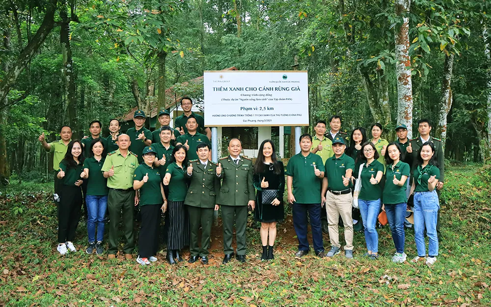 Visitors participating in the community program “Greening the Old Forest” at Cuc Phuong National Park