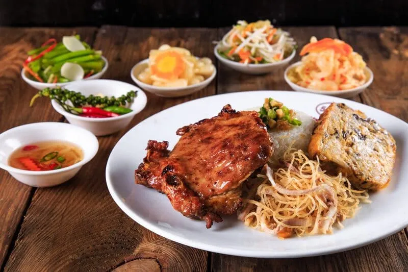 Cơm Tấm Thuận Kiều restaurant in Saigon, a 40-year-old establishment, with a classic storefront and signage.