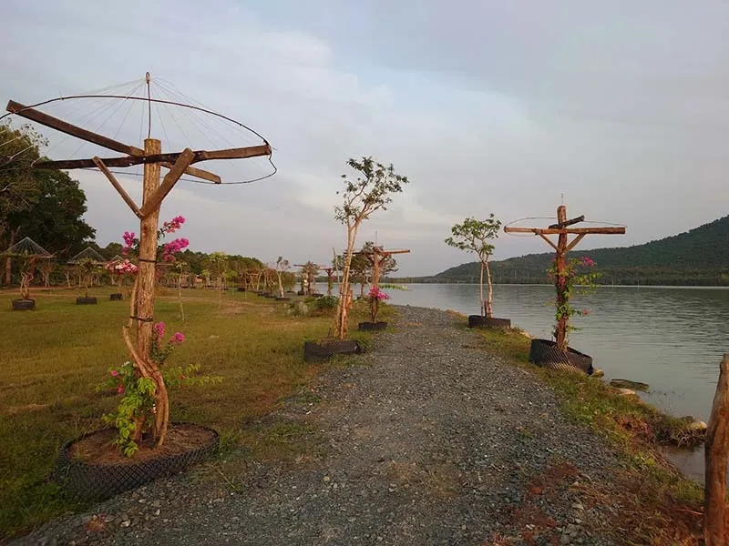 Stone path by the lake at Bang Lang Glamping