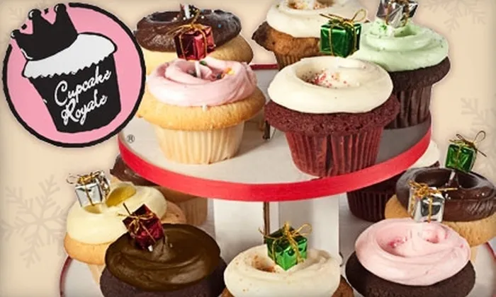Display case of colorful cupcakes and ice cream at Cupcake Royale