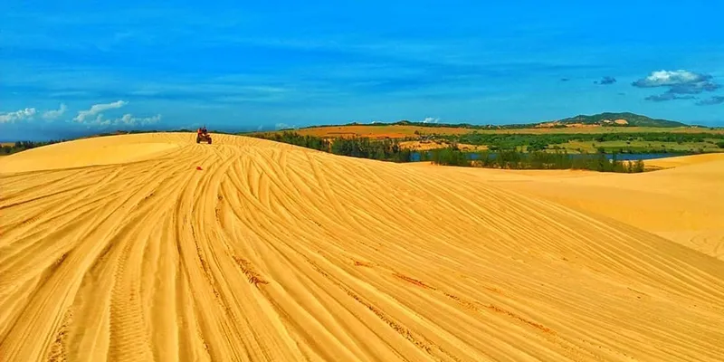 Flying Sand Dunes with a characteristic yellow color and ever-changing shapes.