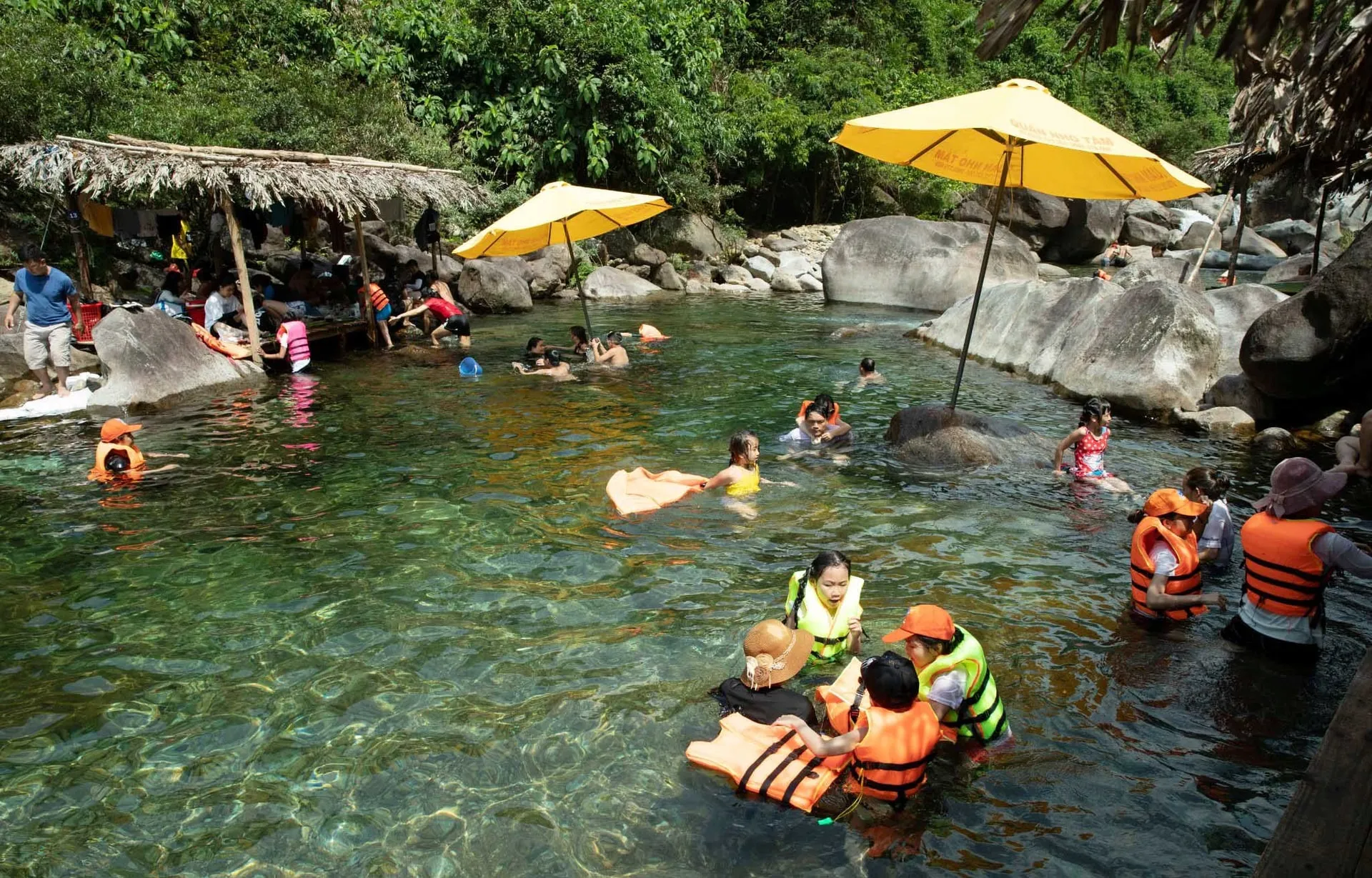 Tourists visiting Suoi Tien on sunny days