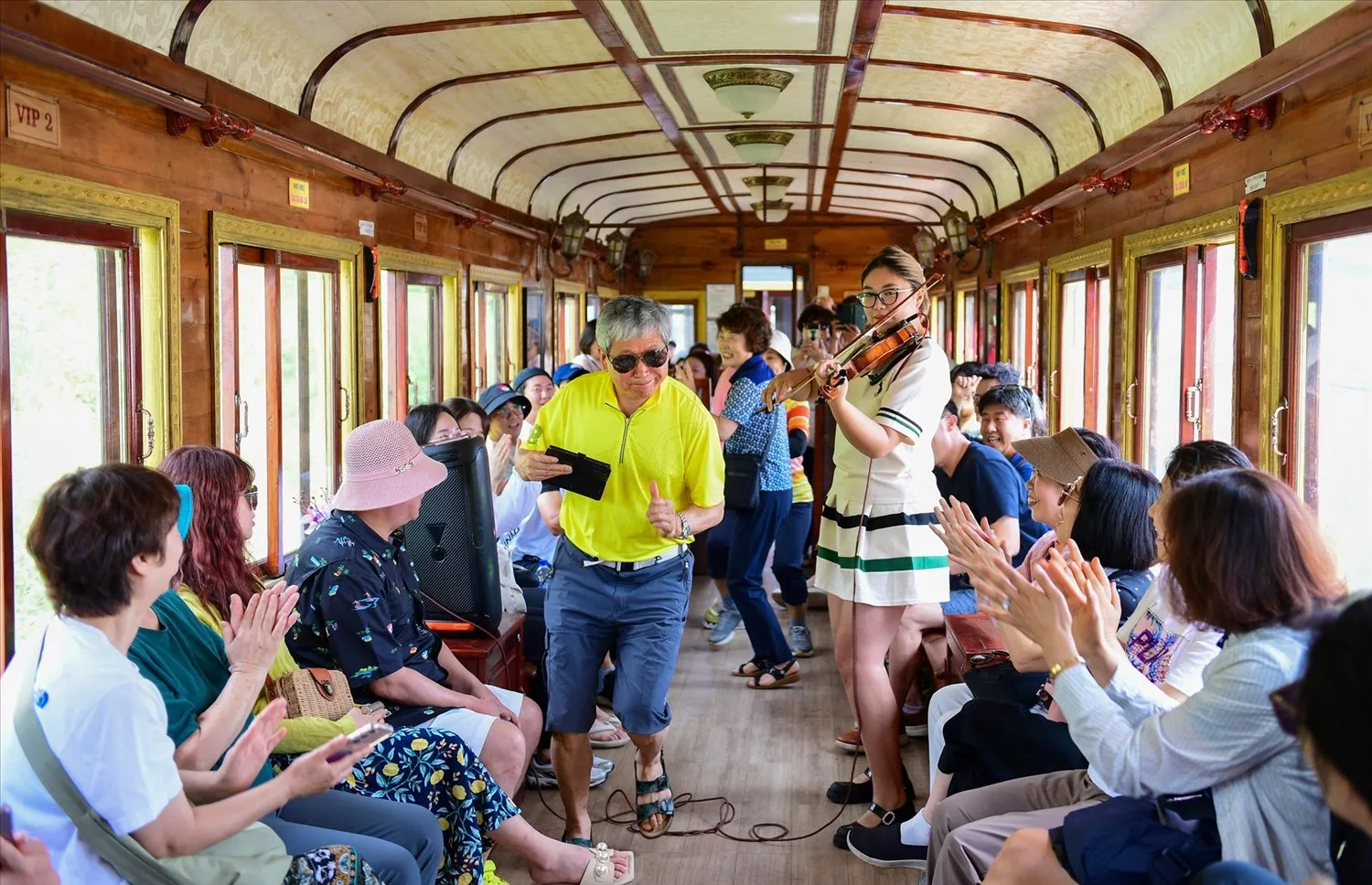 Korean tourists enjoying the experience on the train