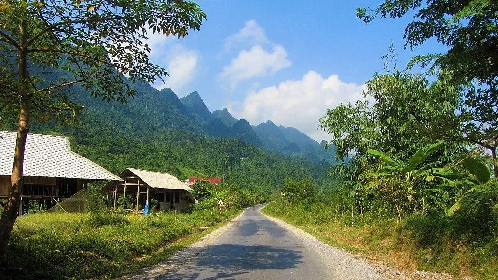Tourists experiencing motorbiking on Ma Pi Leng Pass, Ha Giang