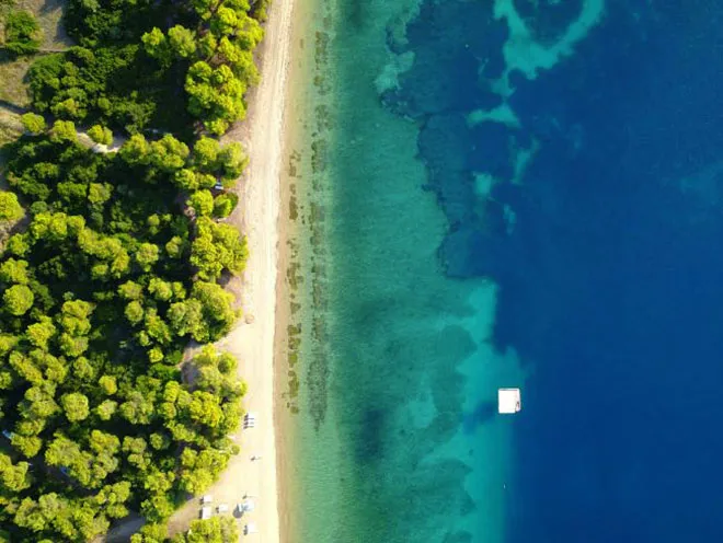 A boat tour in Lichadonisia showcasing the turquoise waters and small islands
