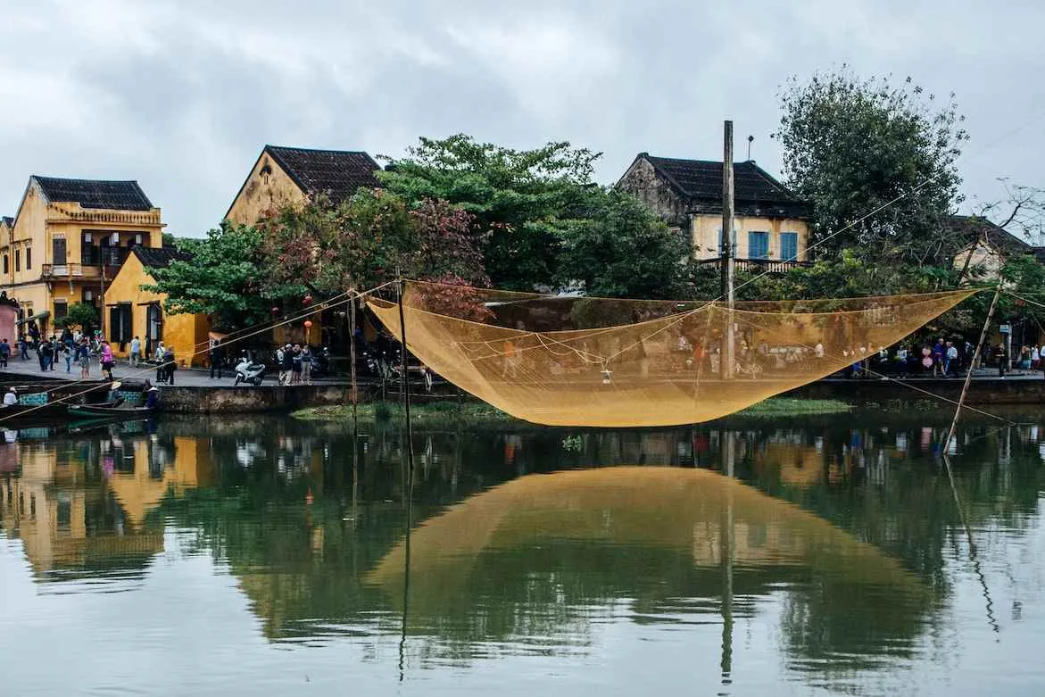 The Thu Bon River reflects the rich culture and history of Hoi An as a former international trading port.