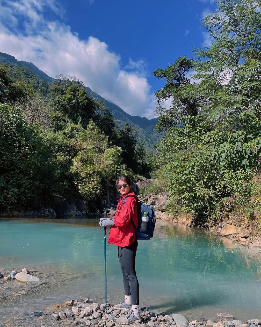 Green, peaceful natural lake on the way to Ta Chi Nhu peak.