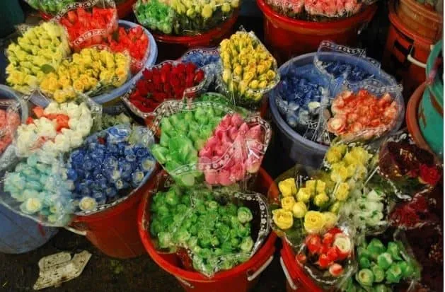 Close-up of vibrant, fresh flowers for sale at Ho Thi Ky Market.