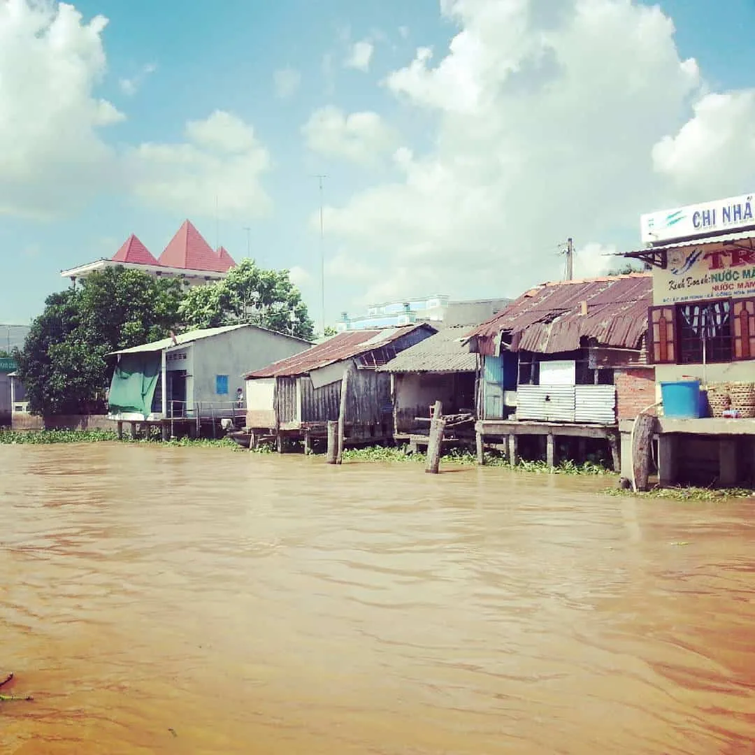 Sunset over Cai Be Floating Market, peaceful and romantic scenery