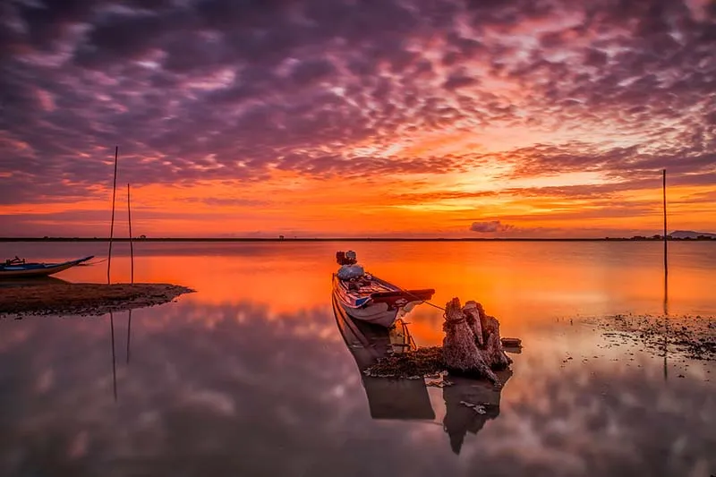 Fiery red sunset on Dau Tieng Lake
