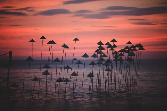 Sunset at Sunset Sanato Beach Club, Phu Quoc, where unique architectural works create an impressive sunset scene.