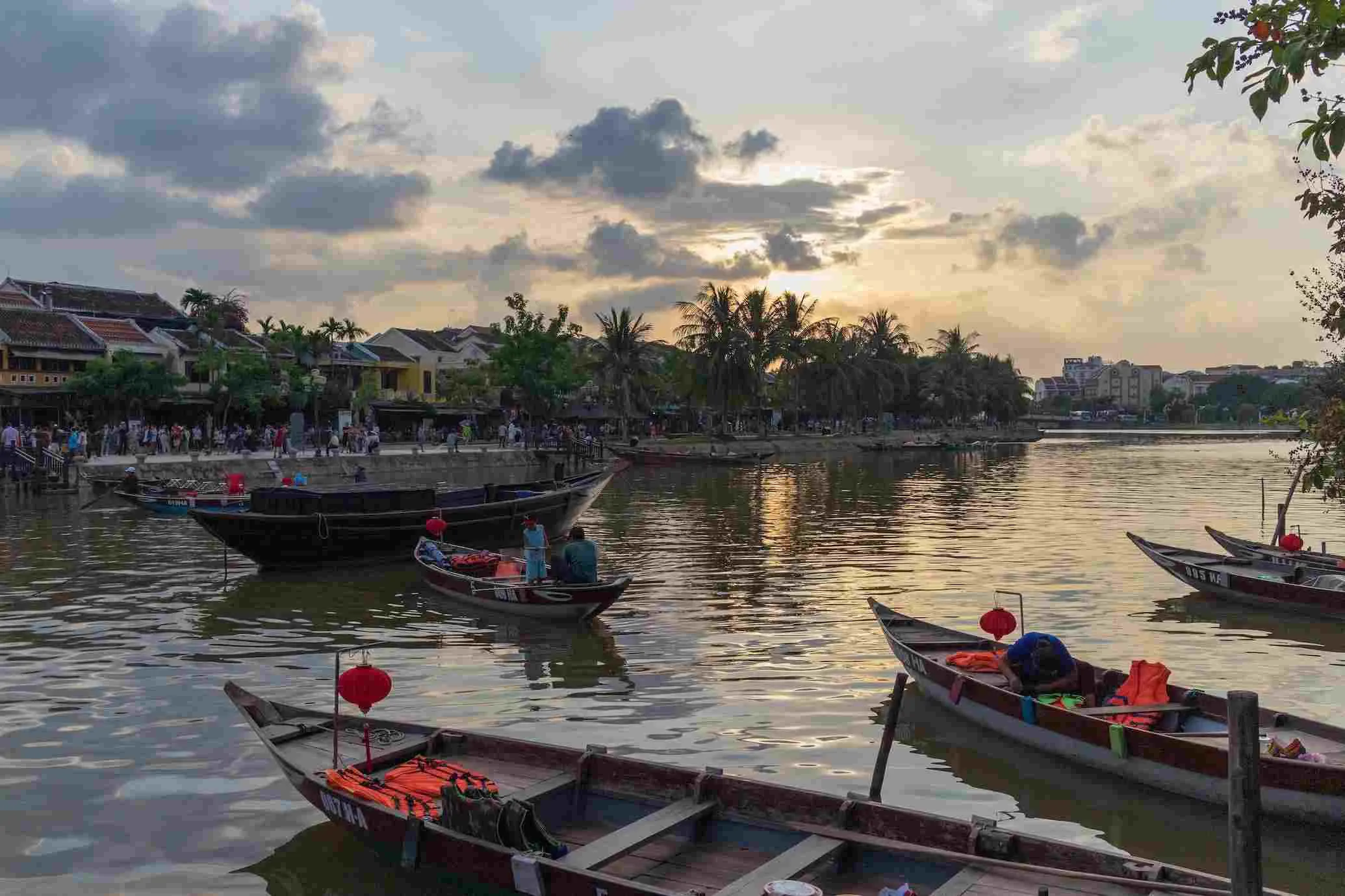 Hoi An in the golden light of sunset, creating a peaceful atmosphere.