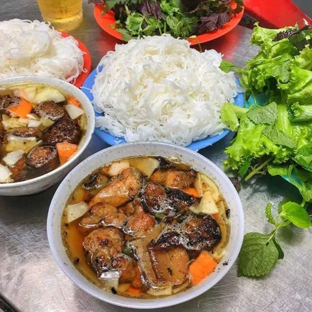 The space at Bun Cha Alley 74 Hang Quat is always bustling with customers coming and going