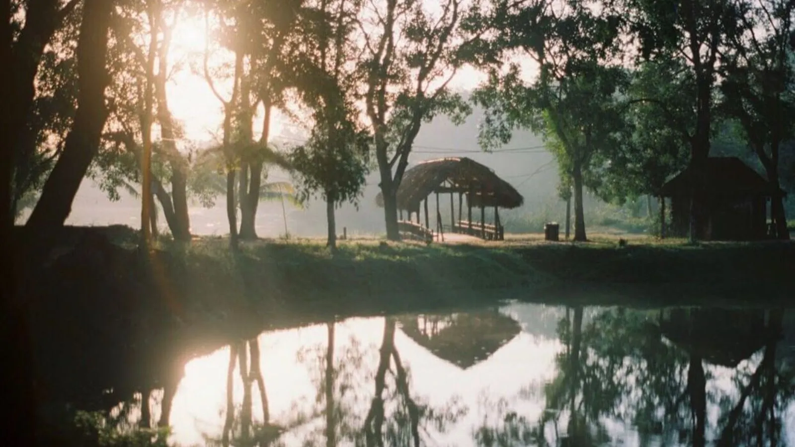 Camping tents by the lake in Cao Minh Ecotourism Area, Dong Nai