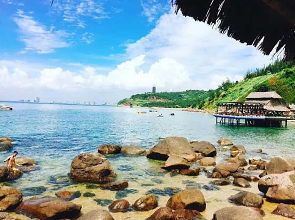 Peaceful scenery at Bai Rang beach with clear blue water and long sandy beach