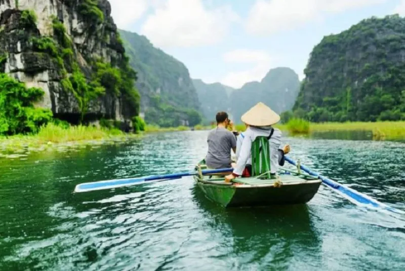 Majestic natural scenery of Trang An with overlapping mountains and clear blue rivers