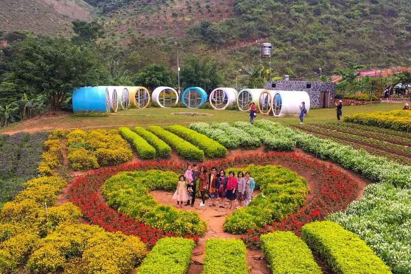 Green campus at Happy Land Moc Chau, Vietnam, where visitors can immerse themselves in nature and experience rural life.