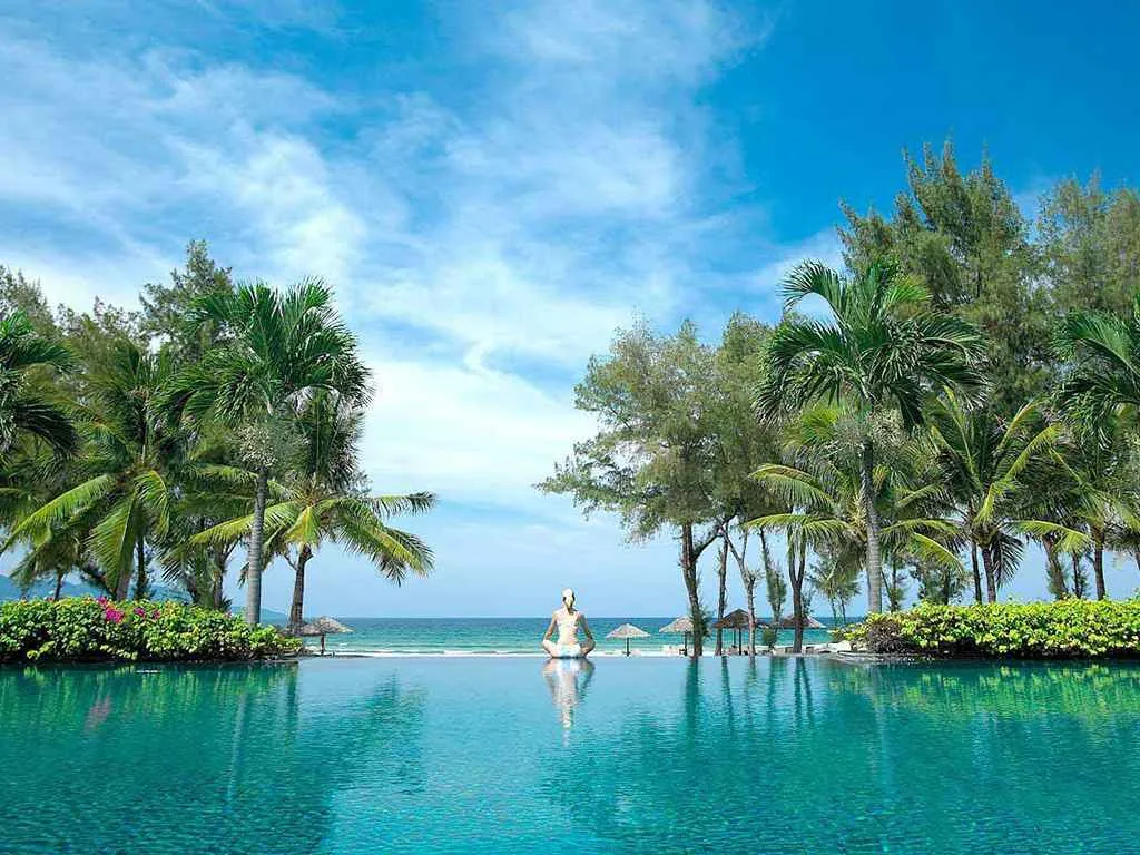 lush green campus and pool at Furama Resort Da Nang