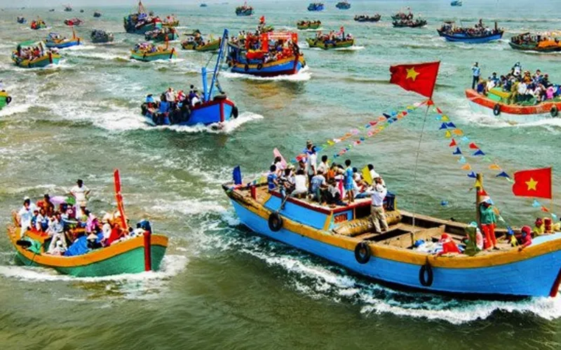 Boat procession carrying the Whale God at Nghinh Ong Festival, Can Gio, a unique cultural feature of the Southern coastal region