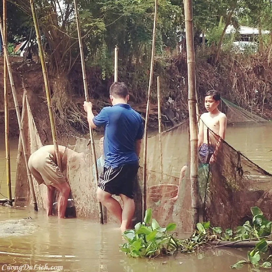 A bustling floating market scene in Mekong Delta during the flood season