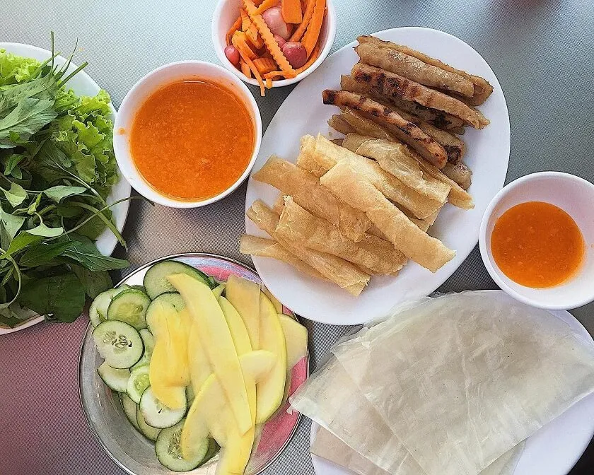 Grilled pork sausage at Nha Trang restaurant, a delicious and cheap Nem Nuong restaurant in Nha Trang, spacious space, rich flavor