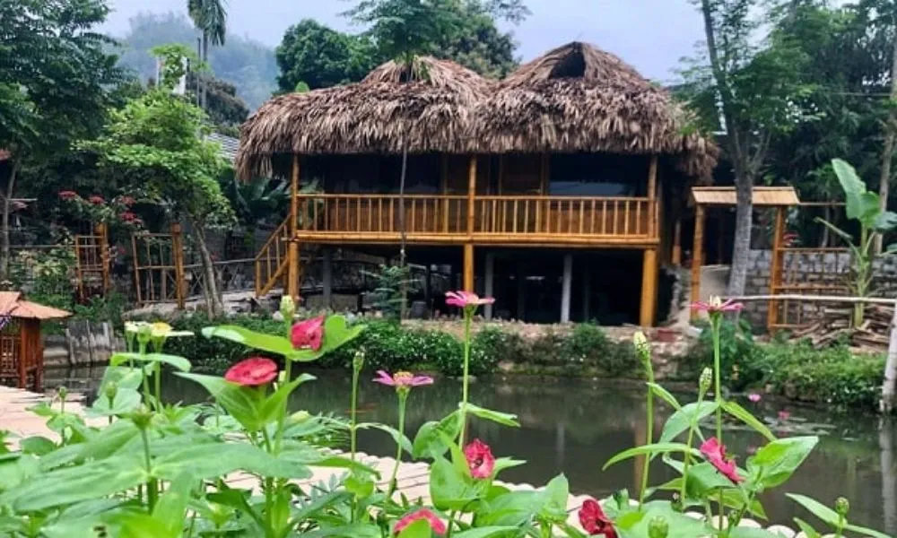 Communal stilt house at Mai Chau homestay, a space for experiencing Thai collective culture