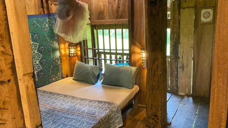 Room at Du Gia Homestay offering relaxing and nature-connected feeling