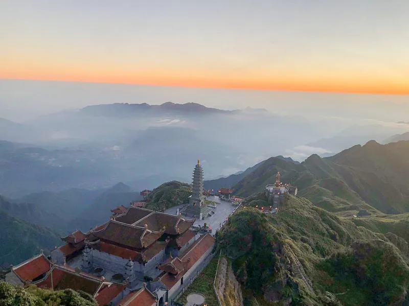 Spiritual architectural complex on Fansipan peak amidst majestic mountains and forests