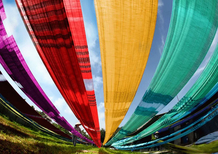 Handmade silk weaving process at Van Phuc craft village