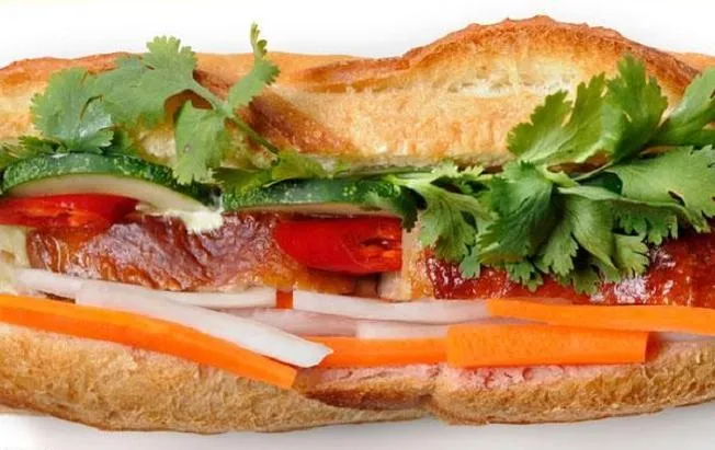 Diners will be mesmerized by the roasted pork banh mi with full of colors, smells, and tastes in Hoi An banh mi